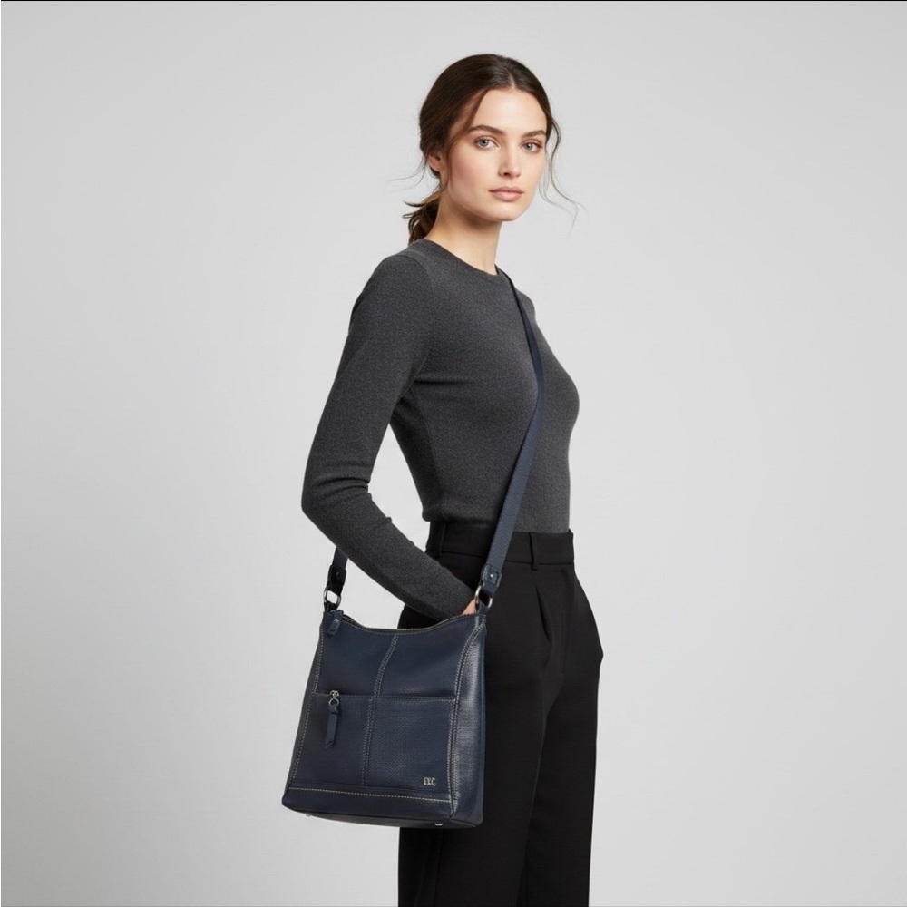 The SAK Iris Indigo Navy Pebbled Leather Adjustable Strap Crossbody Purse
